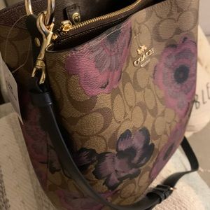 Small coach bucket bag